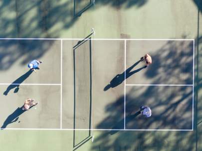 Residents playing tennis