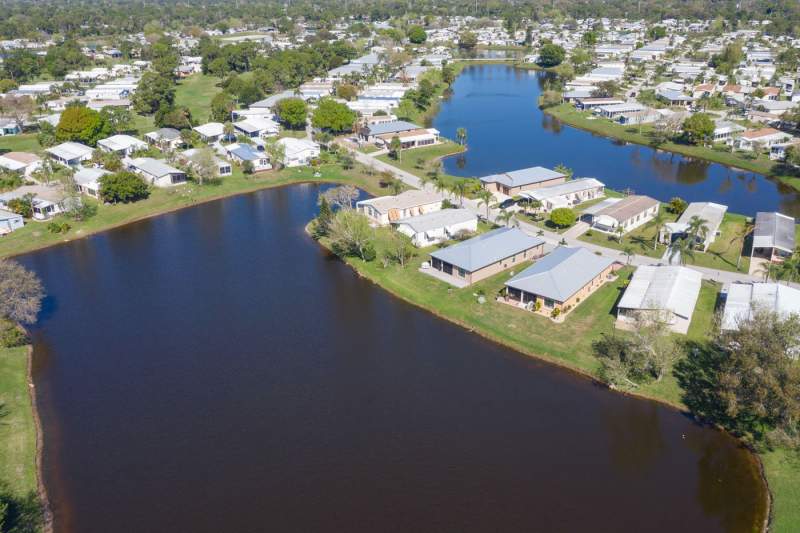 Aerial of homes and lakes at Spanish Lakes. 