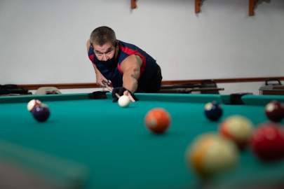 Resident playing pool