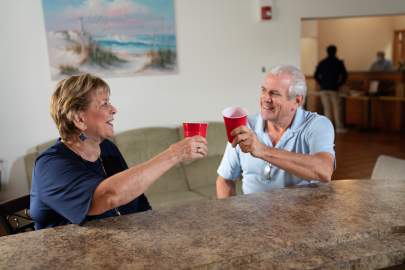 Two residents enjoying beverages 